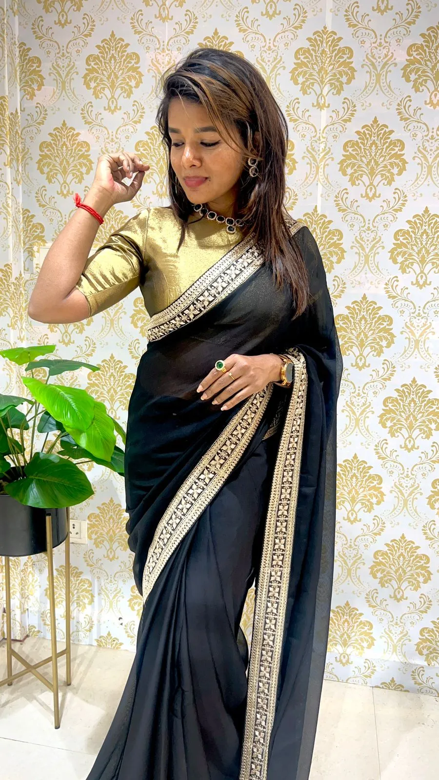 Black jute saree with varanasi gold tissue blouse